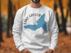 White sweatshirt with Lake Gregory California map and compass graphic.