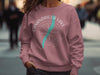 Dusty rose crewneck sweatshirt with Canandaigua Lake compass design and "New York" text.
