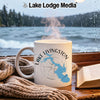 White mug with "Lake Livingston Texas" and map on it, steaming beside a book.
