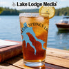 Glass of iced tea with lemon, featuring a blue lake map and compass design.
