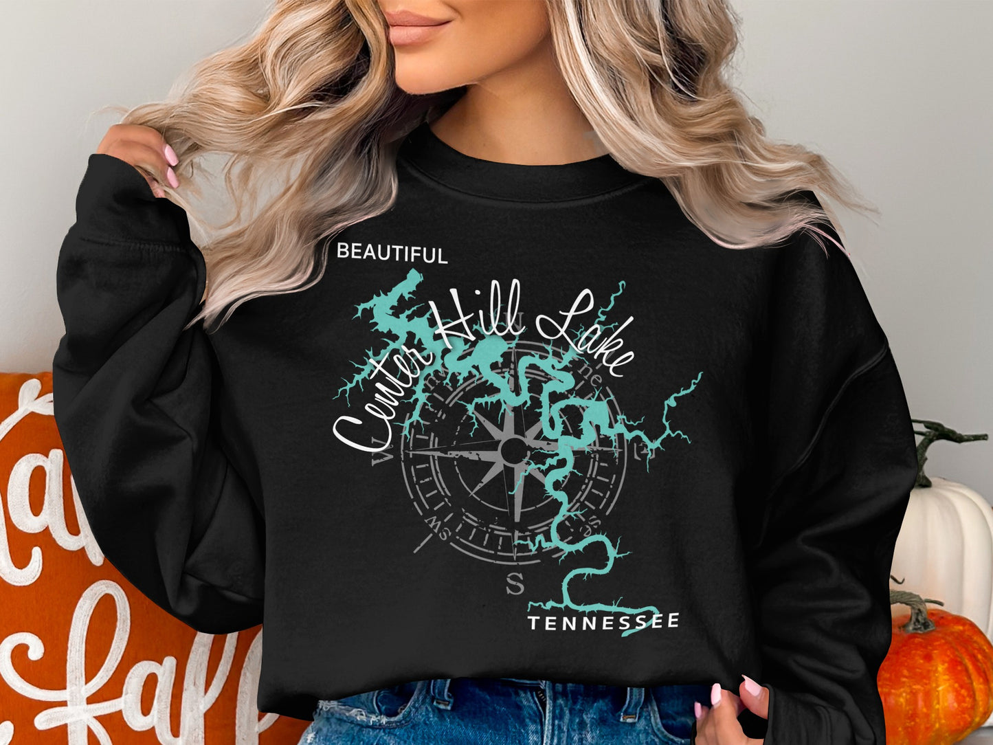 Black sweatshirt with "Beautiful Center Hill Lake Tennessee" and compass graphic.