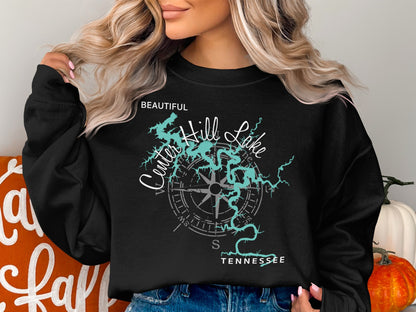 Black sweatshirt with "Beautiful Center Hill Lake Tennessee" and compass graphic.