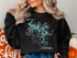 Black sweatshirt with "Beautiful Center Hill Lake Tennessee" and compass graphic.
