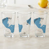 Three clear glasses with Sylvan Lake map and compass design.