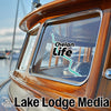 Chelan Life sticker on boat window with Lake Lodge Media logo below.
