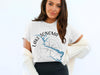 White t-shirt with a lake map and compass graphic reading "LAKE SONOMA CALIFORNIA".