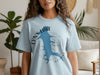 Light blue t-shirt with blue Lynx Lake outline, compass, and "Arizona" text.