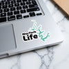 Norfolk Life sticker with teal lake outline on a laptop