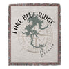 Woven blanket with Lake Blue Ridge Georgia map, compass rose, and text.