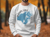 White sweatshirt with a blue map of Indian Lake Ohio, compass rose, and text.