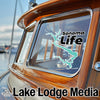 Sonoma Life sticker on a boat window, with Lake Lodge Media text.