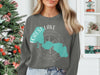 Grey sweatshirt with Forest Lake, Minnesota map and compass graphic.
