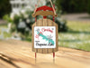 Sled ornament with "Merry Christmas from Grapevine Lake" text and snowflake design.