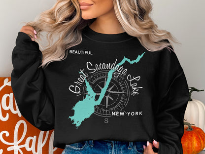 Black sweatshirt with turquoise outline of Sacandaga Lake and compass rose graphic.