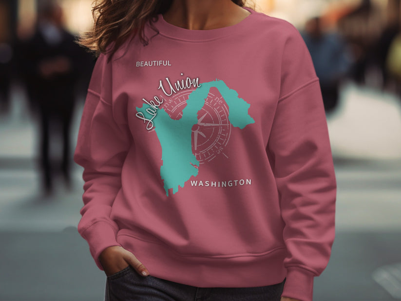 Pink sweatshirt with "Beautiful Lake Union Washington" map and compass graphic.