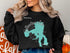 Black sweatshirt with "Yellowstone Lake Wyoming" map design and compass rose.