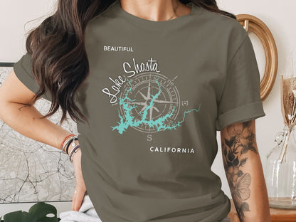 Woman wearing a grey t-shirt with a compass and "Lake Shasta CALIFORNIA" text.