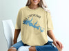 T-shirt with Lake Cachuma California map graphic and compass design.