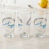 Three glasses with "Greers Ferry Lake Arkansas" and a compass rose map design.