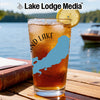Glass of iced tea with lake graphic, lemon slice, and Lake Lodge Media logo.