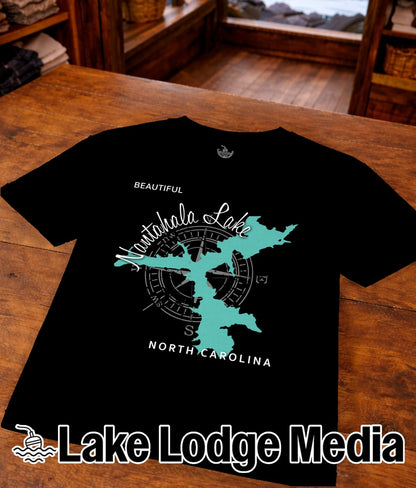 Black t-shirt with a teal North Carolina outline and compass rose design.