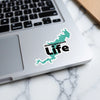 Wallenpaupack Life sticker in teal shape on a laptop