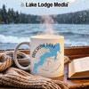 White mug with "Arcadia Lake Oklahoma" design sits by a window.