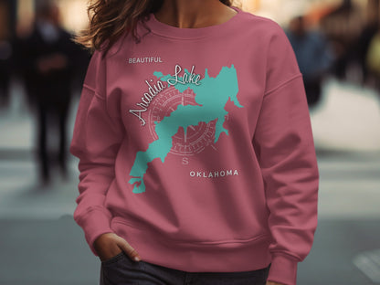 Pink sweatshirt with "Beautiful Arcadia Lake Oklahoma" map design.