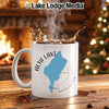 White mug with Alta Lake, Washington map and compass design, steaming coffee splashing.