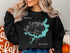 Black sweatshirt with a compass rose and Lake Springfield, Missouri map design.