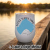 White travel mug featuring a blue lake silhouette and text reading Little Turtle Lake Minnesota on a wooden dock.