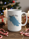 White mug with blue Georgian Bay outline and "Ontario" text, surrounded by Christmas decor.