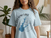 Light blue t-shirt with Folsom Lake California map and compass graphic.