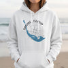 White hoodie with blue Sanibel Island map and compass design.
