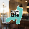 Augur Life sticker with copyrighted text on a textured background.