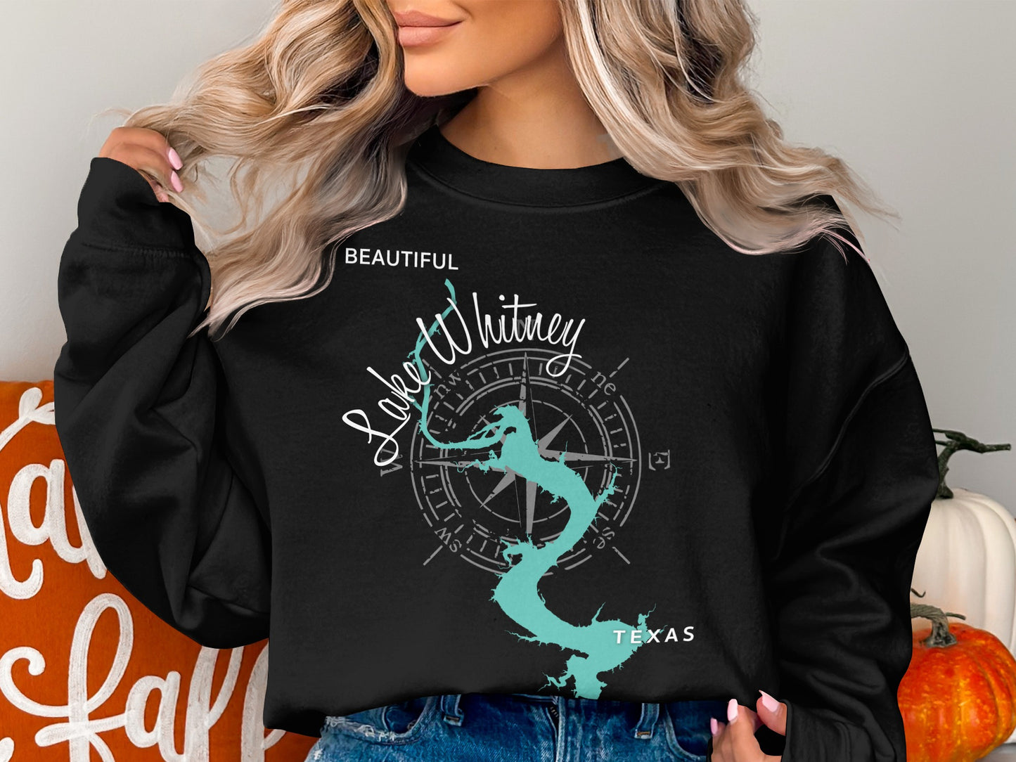 Black sweatshirt with "Beautiful Lake Whitney Texas" and compass graphic.