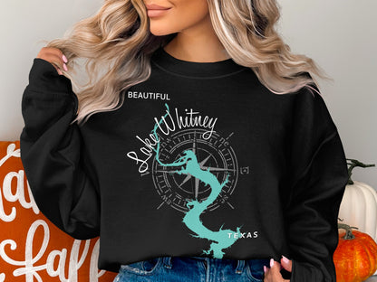 Black sweatshirt with "Beautiful Lake Whitney Texas" and compass graphic.