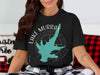 Black t-shirt features Lake Murray California map and compass graphic.