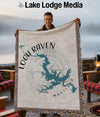 Man holding a woven throw blanket with a map of Loch Raven, Maryland and a compass rose.
