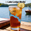 Glass of iced tea with a lemon slice, "S's Lake" design, and lake background.