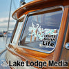 Sticker for Lewis Smith Lake Life on a shiny wooden boat window.
