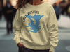 Cream sweatshirt with "Lake Casitas California" text and blue map graphic.