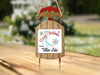 Sled ornament with "Merry Christmas from Tellico Lake" text and snowflake accents.