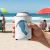 White can cooler with Pyramid Lake silhouette and compass on a beach.