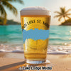 Beer glass on beach with "Grand Lake St. Marys Ohio" text and compass design.