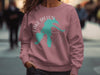 Pink sweatshirt with teal Lake Dillon, Colorado map and compass design.
