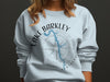 Light blue sweatshirt with Lake Barkley Kentucky map and compass graphic.