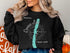 Black sweatshirt with "Beautiful Conesus Lake New York" compass graphic.