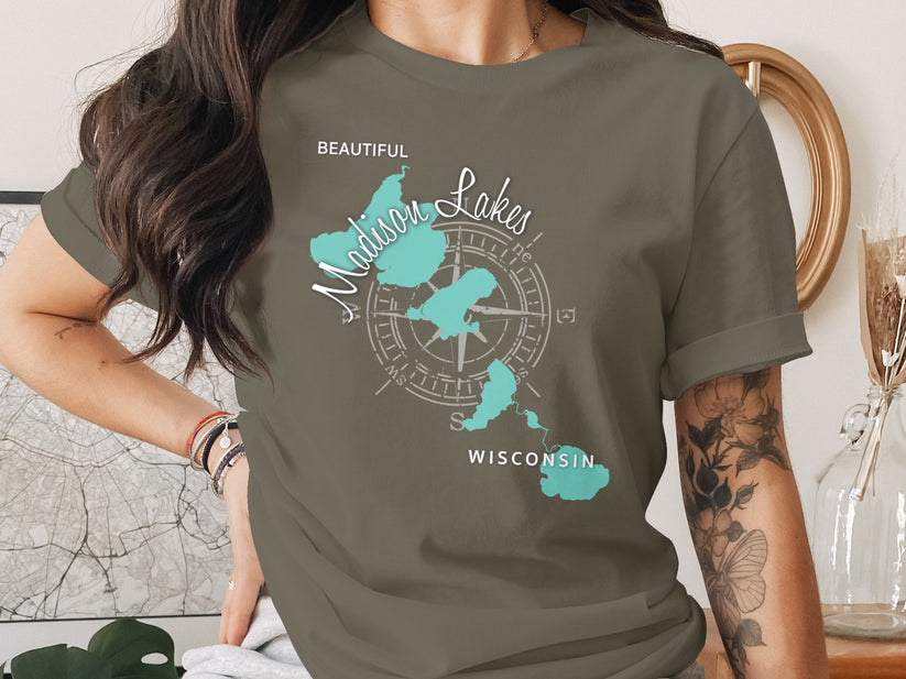 Green t-shirt with "Beautiful Madison Lakes Wisconsin" and compass graphic.