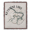 Woven blanket with Keystone Lake map and compass design, "Keystone Lake Oklahoma" text.
